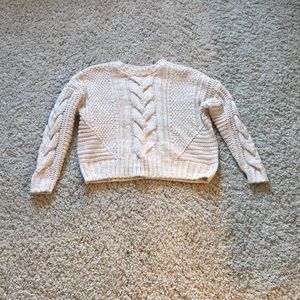 Pink and white knit sweater